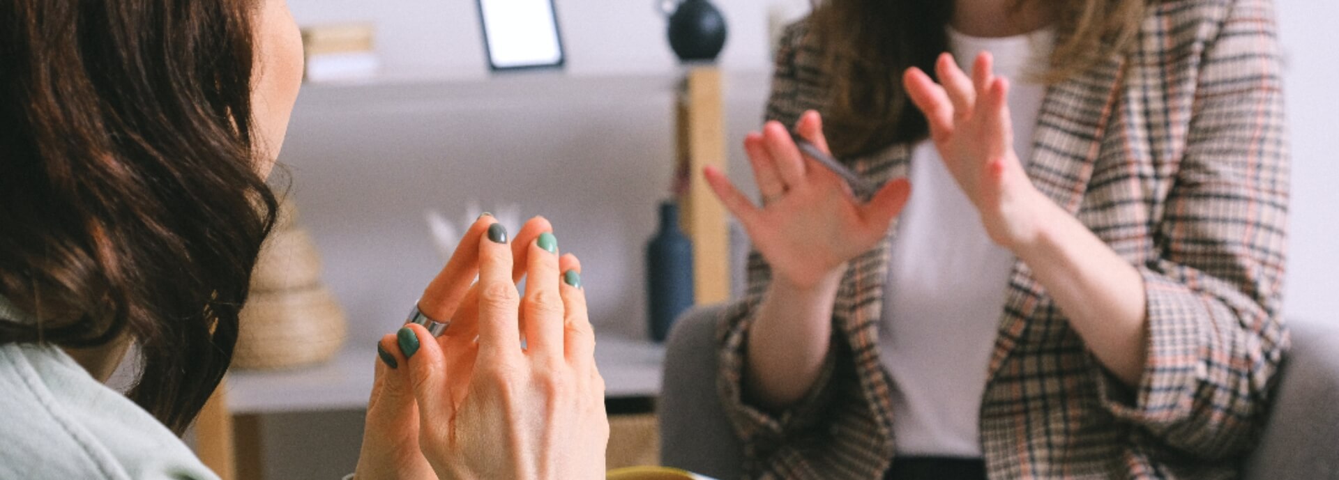 two people in discussion using hands